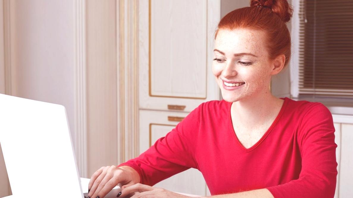 Financial analyst working on detailed spreadsheet model